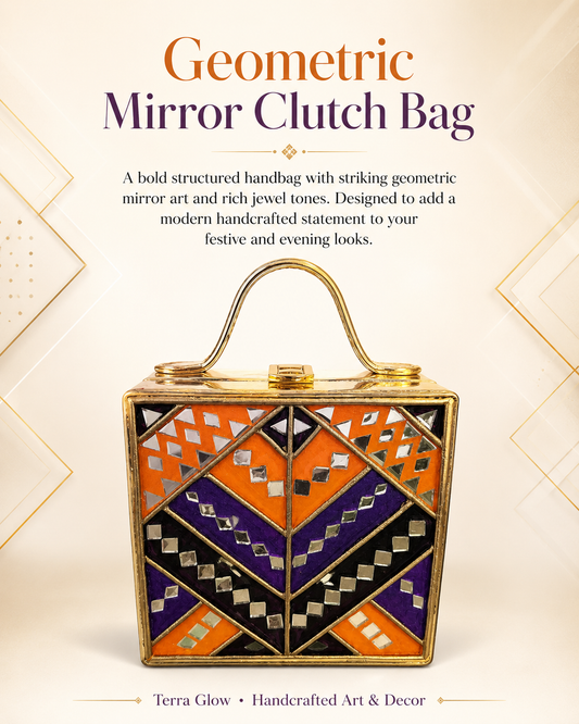 A structured geometric clutch bag with a gold-tone metal frame and handle, decorated with orange, purple, black, and silver mirror mosaic patterns. The bag is presented on a cream-colored background with gold geometric accents and text reading 'Geometric Mirror Clutch Bag' and 'Terra Glow Handcrafted Art & Decor'.